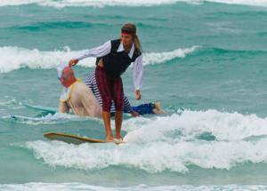 Latest on the Kirra Longboard Klassic: Headstands, dead cockroaches, and a chance of a Kirra barrel 